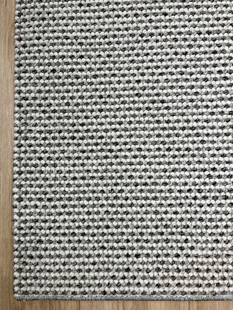 Natural loop pile rug 309 white/dark grey | CREATION