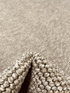 Round, smooth, natural, beige loop rug 229 CREATION