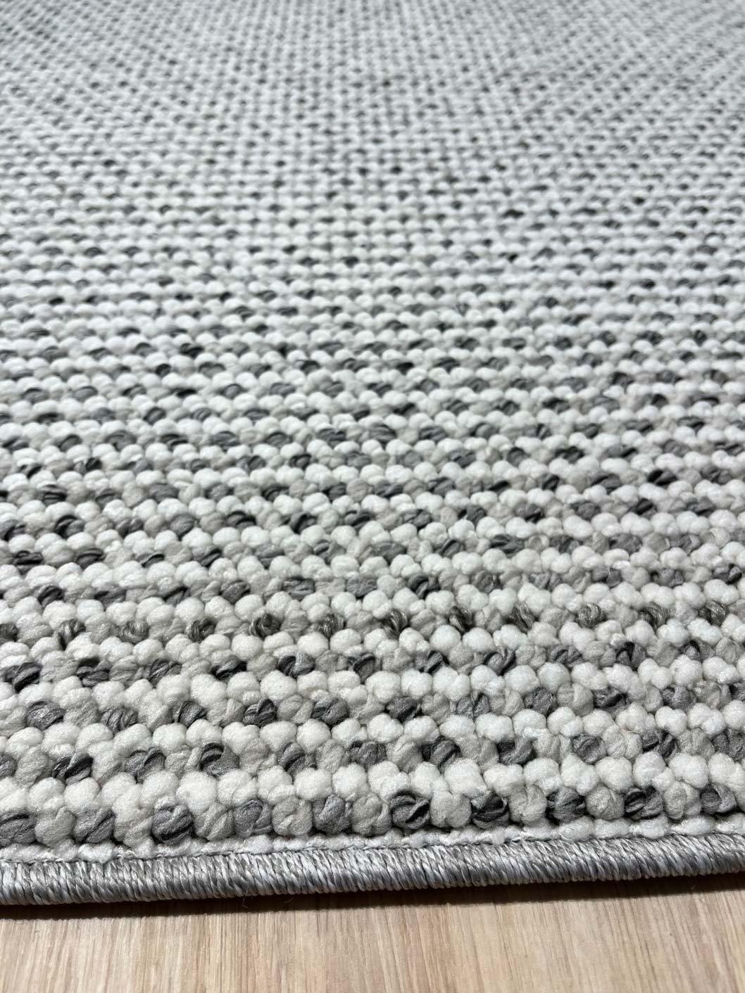 Natural loop pile rug 309 white/dark grey | CREATION