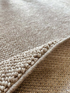 Round, smooth, natural, beige loop rug 229 CREATION